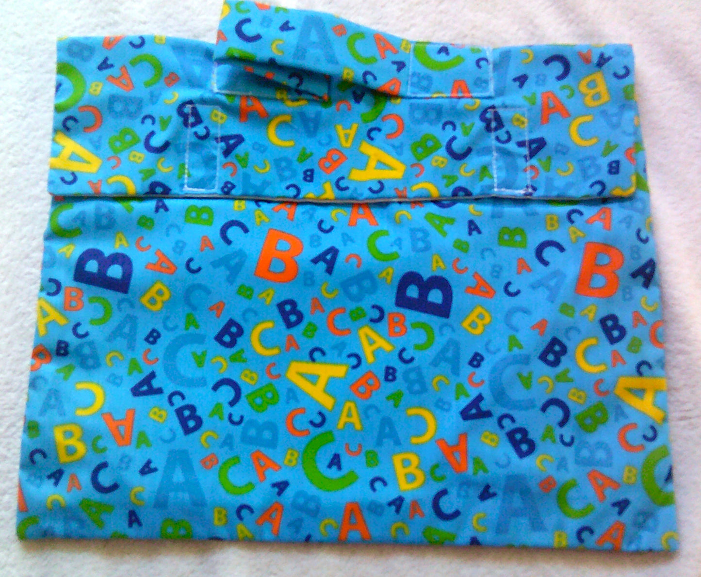 Book bag A,B,C on Blue